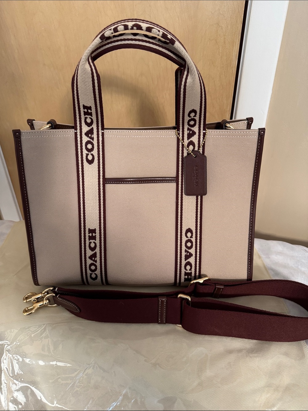 COACH Beige Canvas Tote with Maroon Trim and Logo Straps